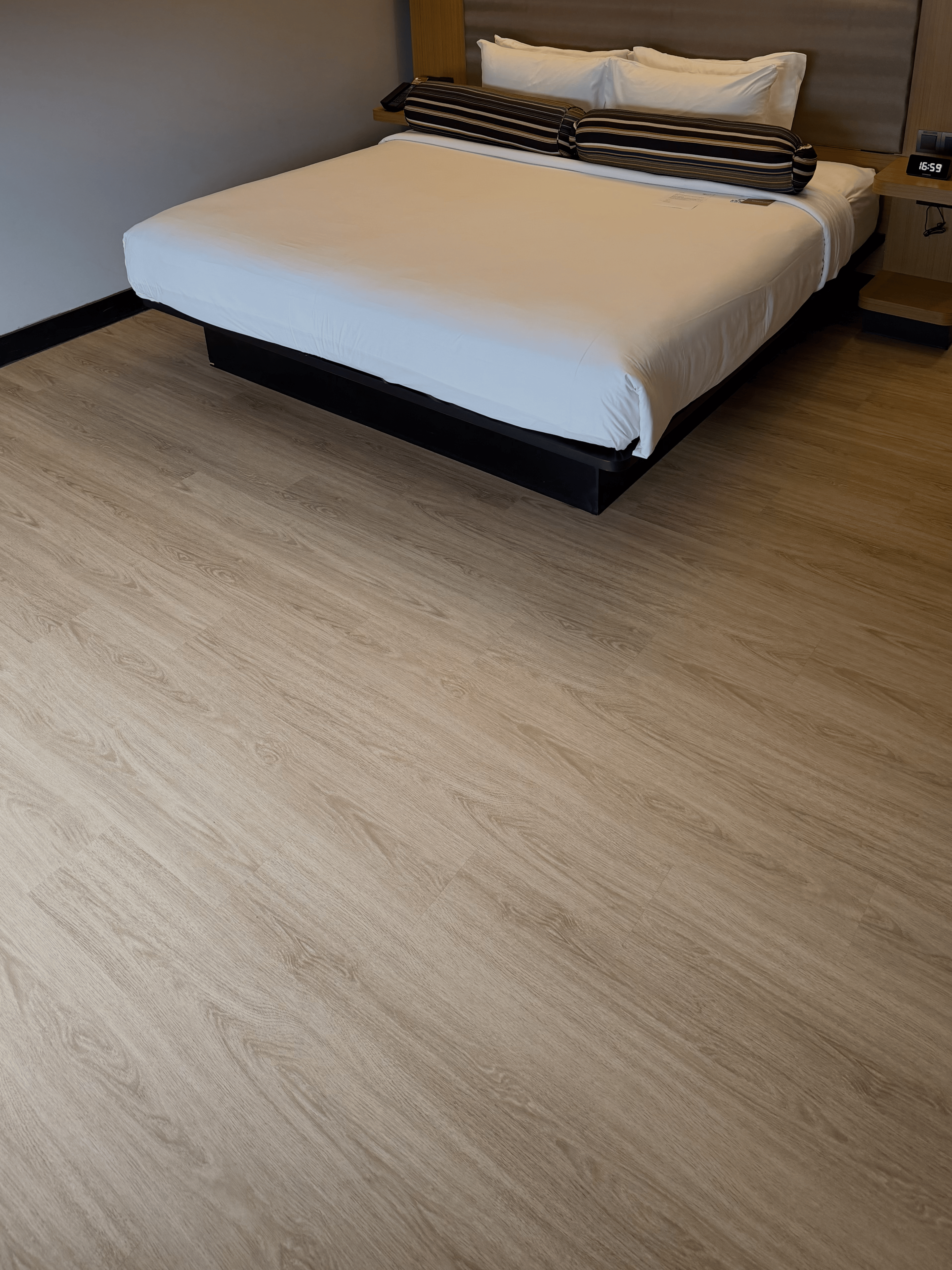Completed commercial room with SPC flooring by Weehome